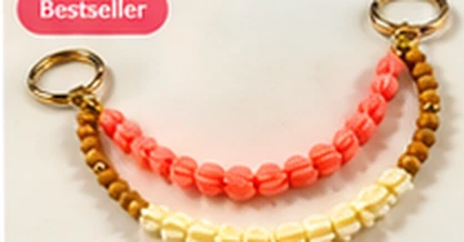 Coral and cream beaded purse charm